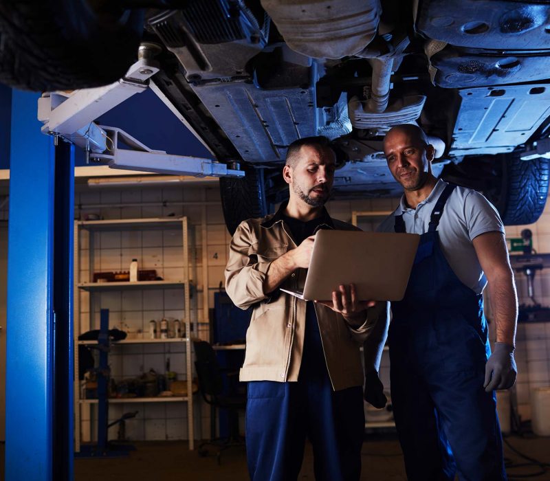 mechanics-inspecting-car-small.jpg